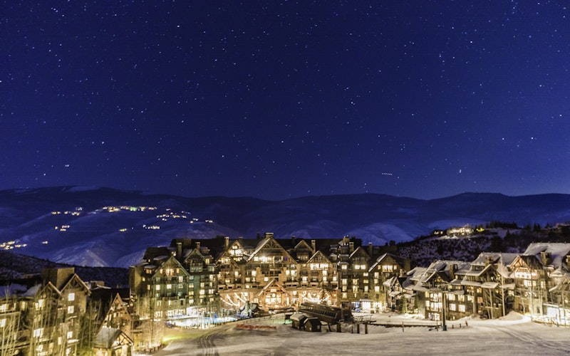 View of Bachelor Gulch Village at night from the ski slopes in Beaver Creek Resort