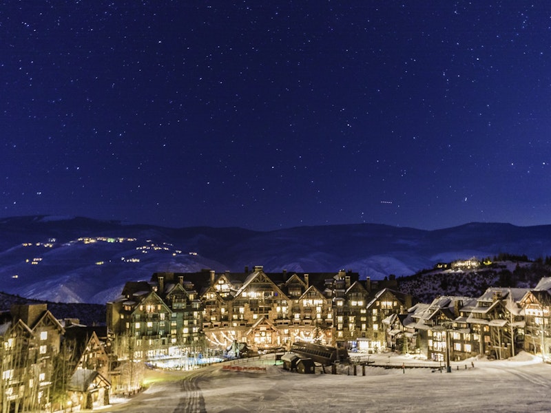 View of Bachelor Gulch Village at night from the ski slopes in Beaver Creek Resort