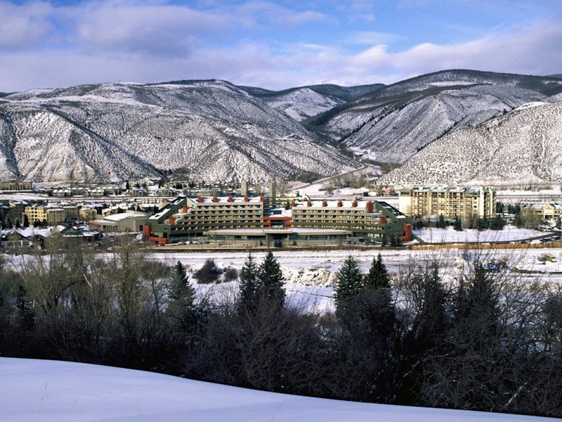 View of Avon with snow capped mountains in the background, Beaver Creek Resort View of Avon with snow capped mountains in the background, Beaver Creek Resort