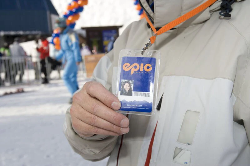 A skier showing a lift pass at a Beaver Creek ski lift
