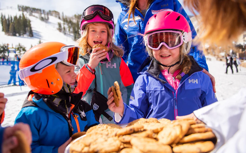 Guests enjoying fresh-baked cookies during Beaver Creek’s Cookie Time Guests enjoying warm fresh-baked cookies during Beaver Creek's daily 3pm cookie tradition
