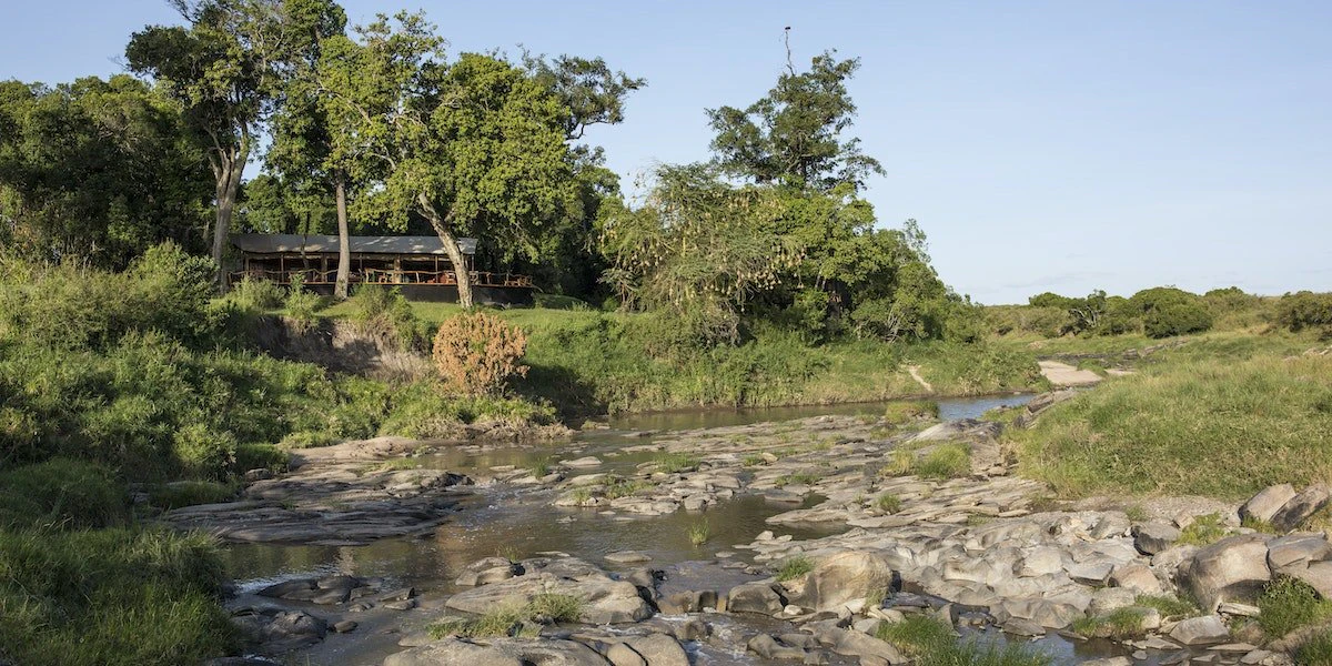 External view of the Rekero Camp with Talek River in the foreground External view of the Rekero Camp with Talek River in the foreground
