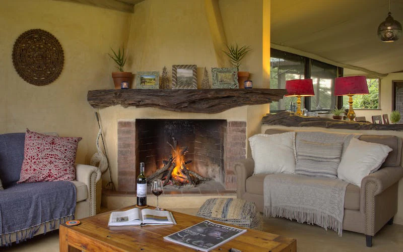 Asilia Ol Pejeta Bush Camp - lounge area with fire