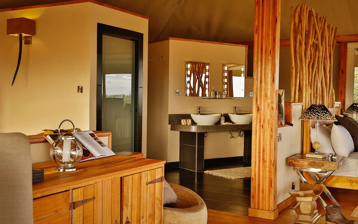 Interior view of the ensuite bathroom inside the double tent at Loisaba