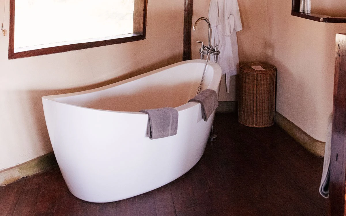 The deep, luxury tub in the en suite bathroom of one of the tents at Tortilis Camp