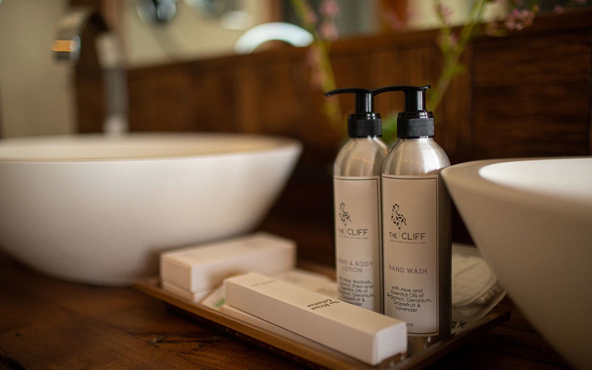 Luxury bathroom amenities available atop the vanity counter in the en suite bathroom at The Cliff