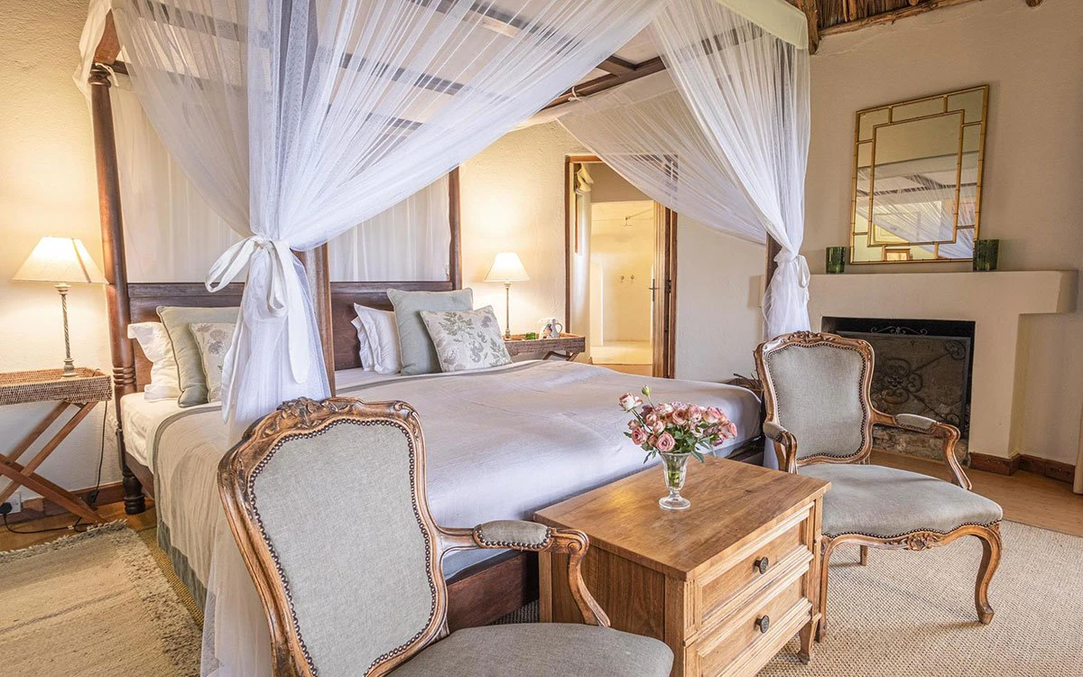 Internal image of a bedroom at Loldia showcasing the luxurious king-size bed