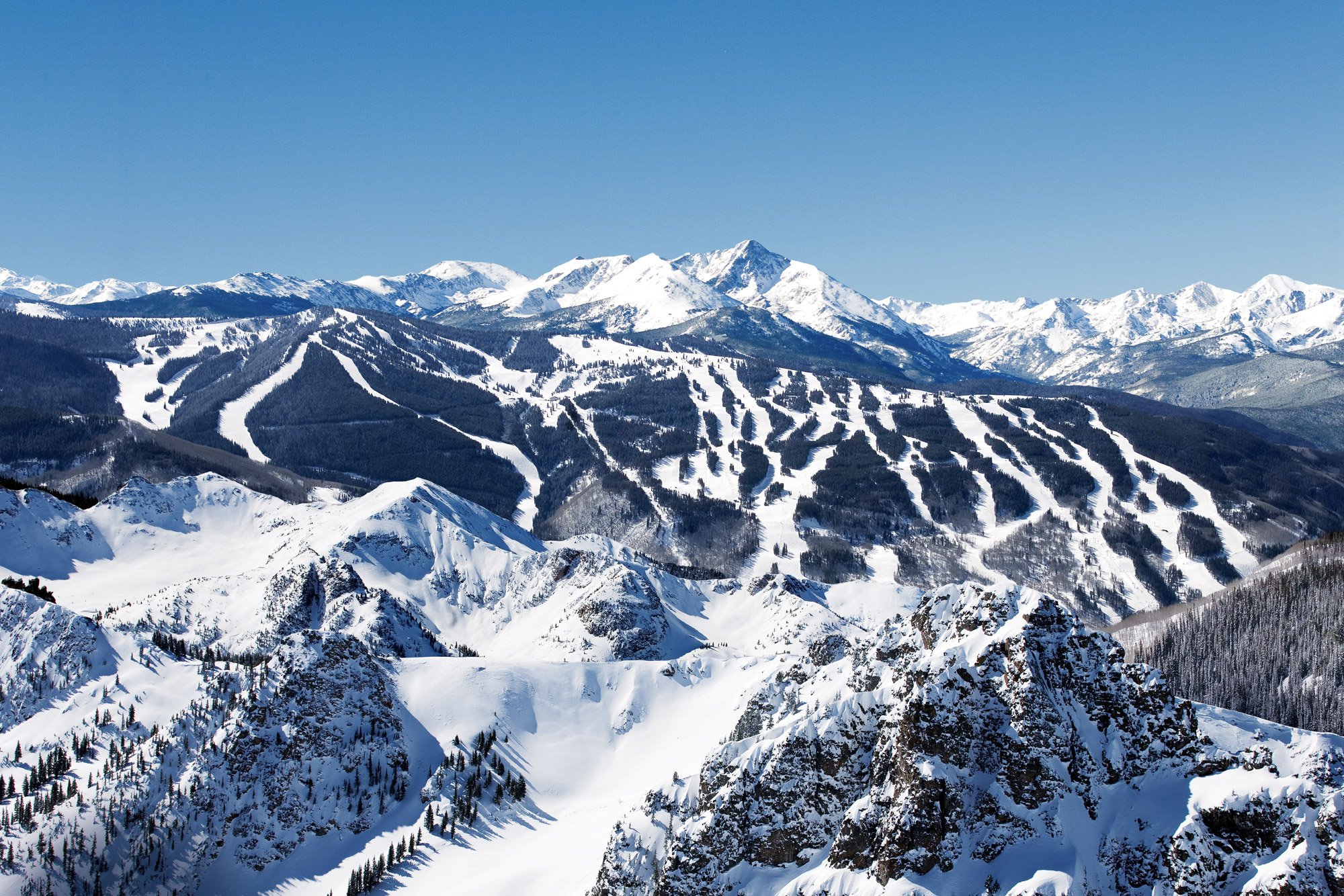 The breathtaking beauty of Vail Resort's immaculate slopes, showcasing the results of meticulous grooming and top-tier snow management.