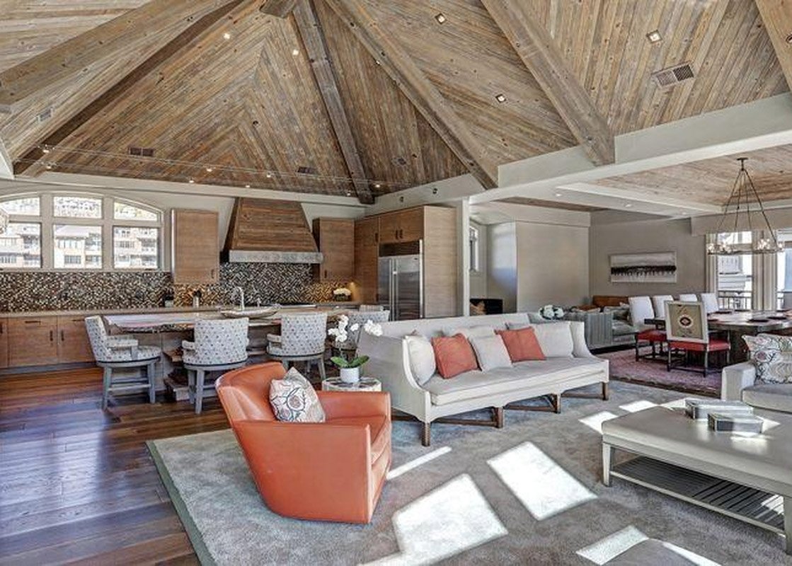 Cozy Living Room with Fireplace and Mountain View at Lion Square Lodge