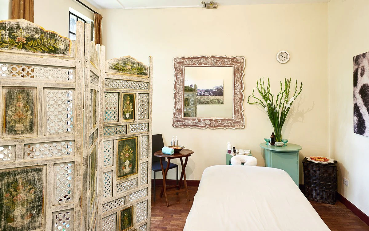 A treatment table at the Giraffe Manor spa waiting invitingly for someone to enjoy a massage