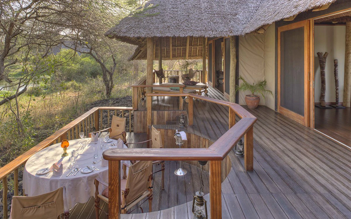 External view of the elevated deck at the Family Suite showcasing the outdoor dining table
