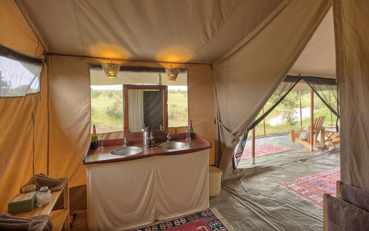 Internal view of the sinks inside an en suite bathroom in a tent at Ol Pejeta
