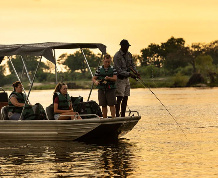 A group of guests head out to enjoy a morning fishing with an experienced guide at sunrise