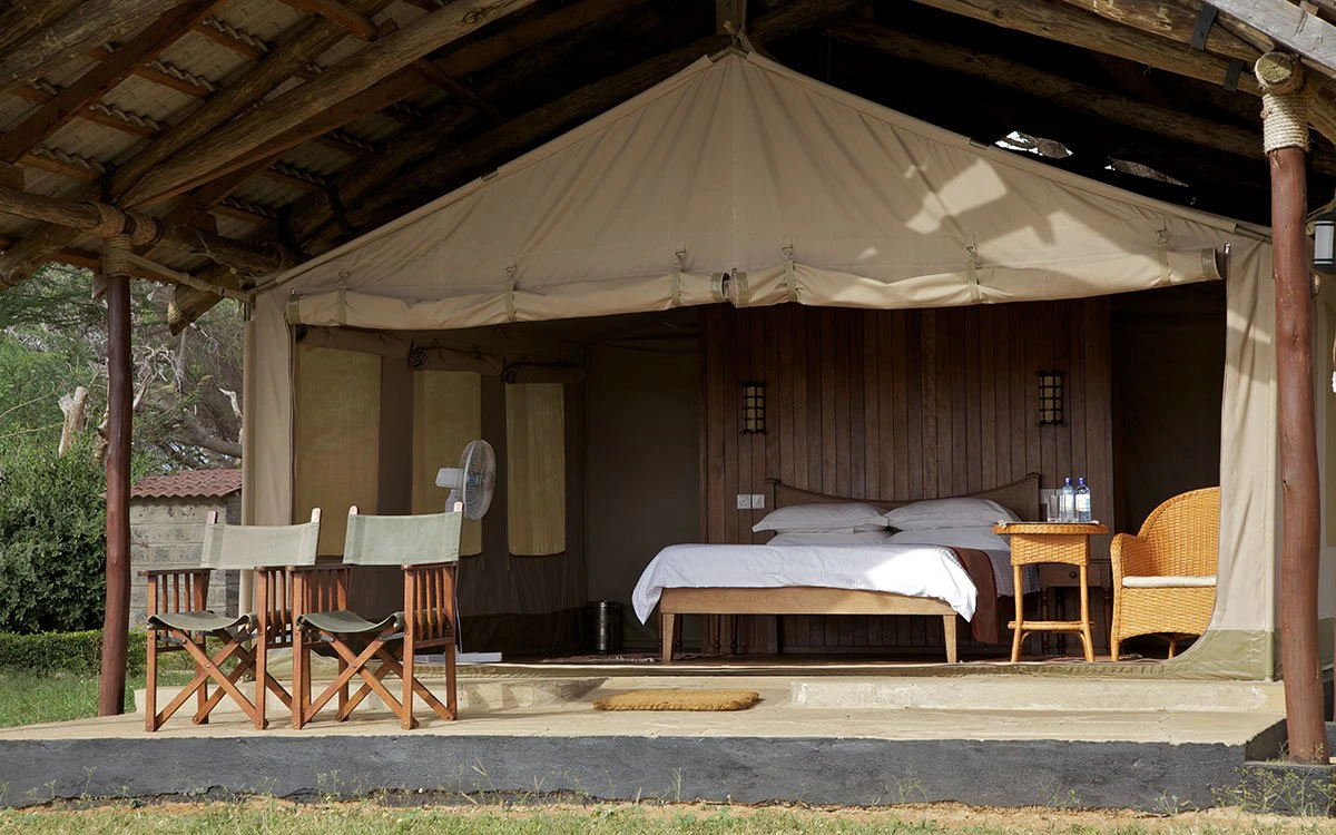 View from outside looking into one of Ashnil Aruba's luxury tents