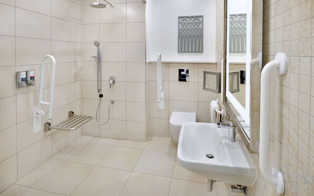 Interior image of an accessible bathroom at one of Four Points by Sheraton's luxury suites