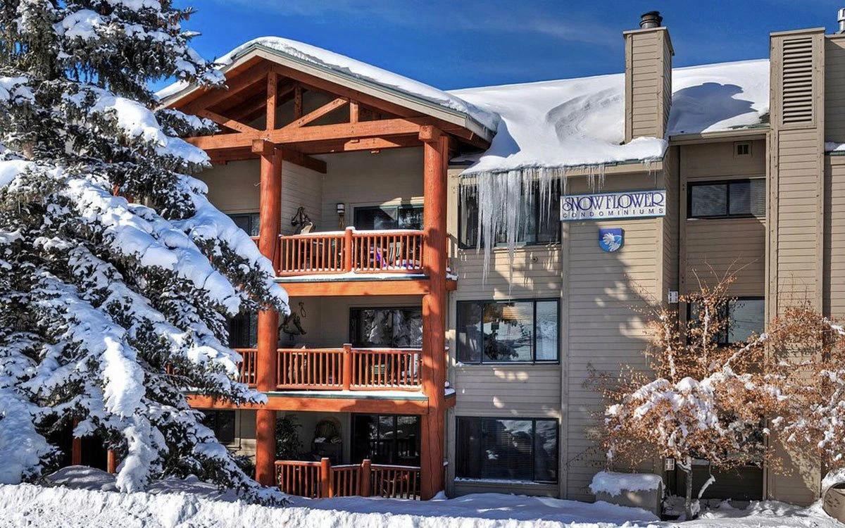 An external image of Snow Flower condominiums in the middle of winter.