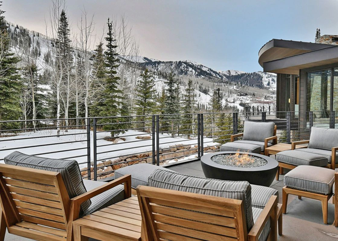 Image from the large balcony at Iron Mountain Chalet, complete with fireplace and seating.