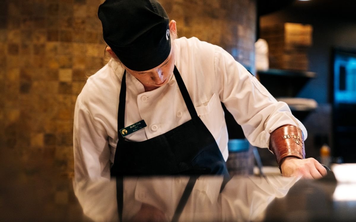 A chef prepares a delicious dinner at one of Deer Valley’s many fine dining restaurants