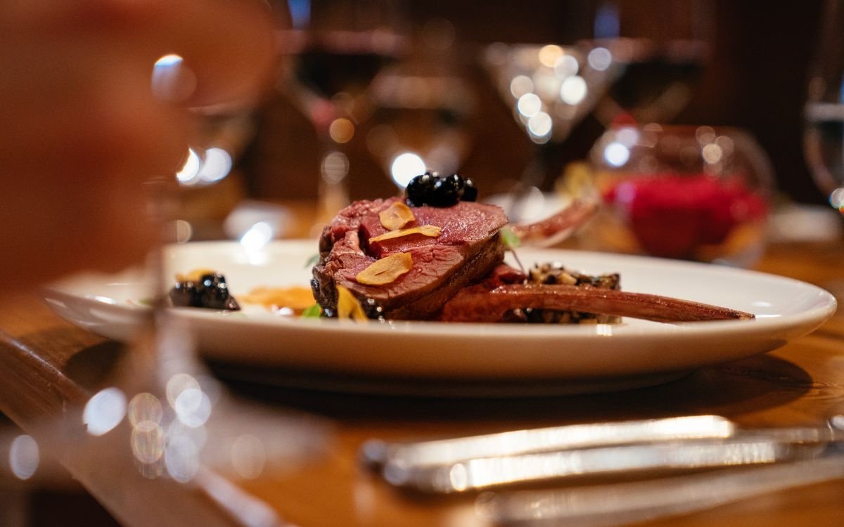 A perfectly cooked piece of meat at Goldener Hirsch Restaurant.