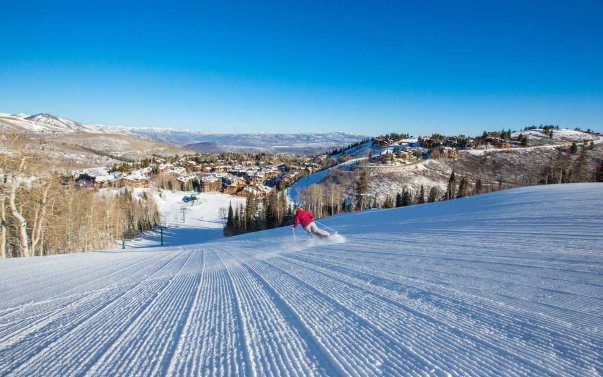 A skier skims down a freshly groomed slope in Deer Valley.