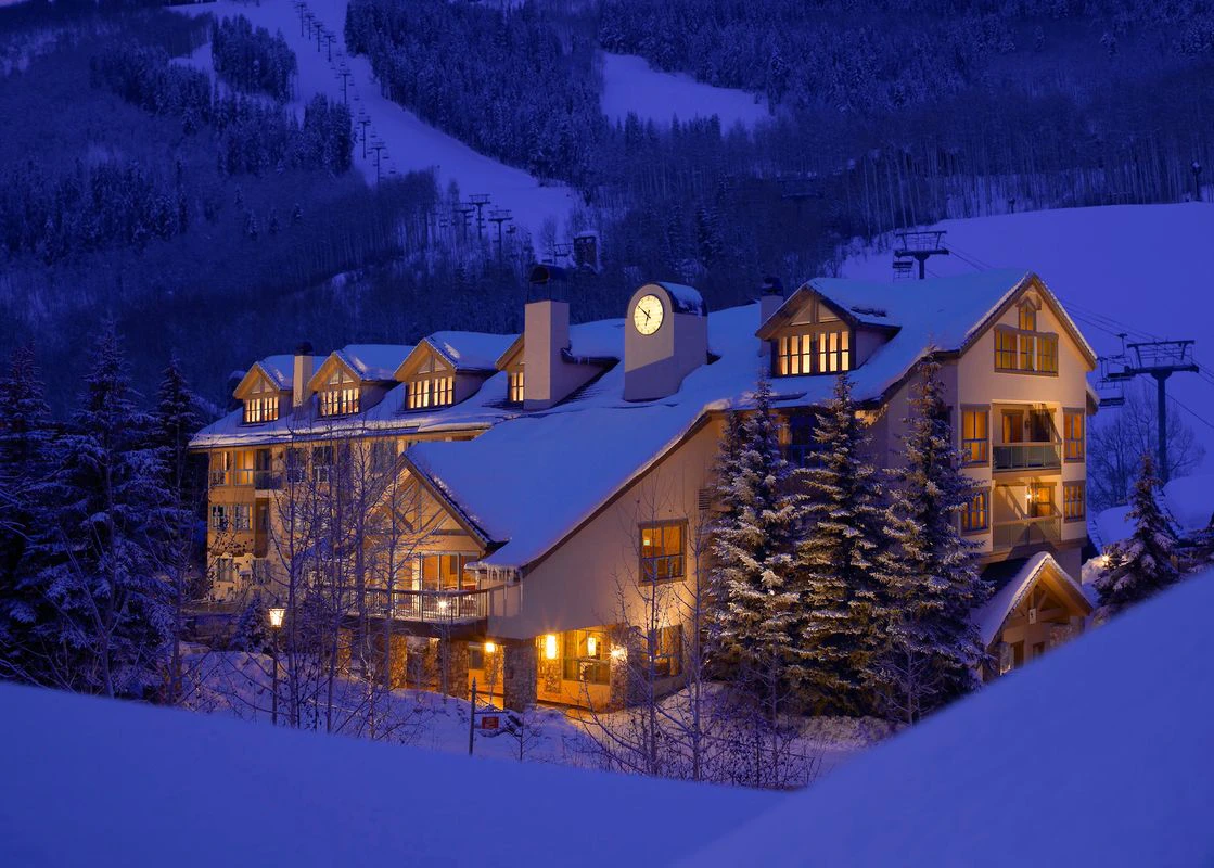 The exterior of the Osprey at Beaver Creek in the early evening during winter.