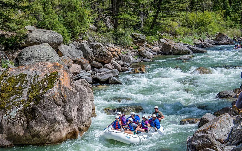Guests white-water rafting in Big Sky, Montana – a summer activity offered near Big Sky luxury rentals. Guests white-water rafting in Big Sky, Montana – a summer activity offered near Big Sky luxury rentals.