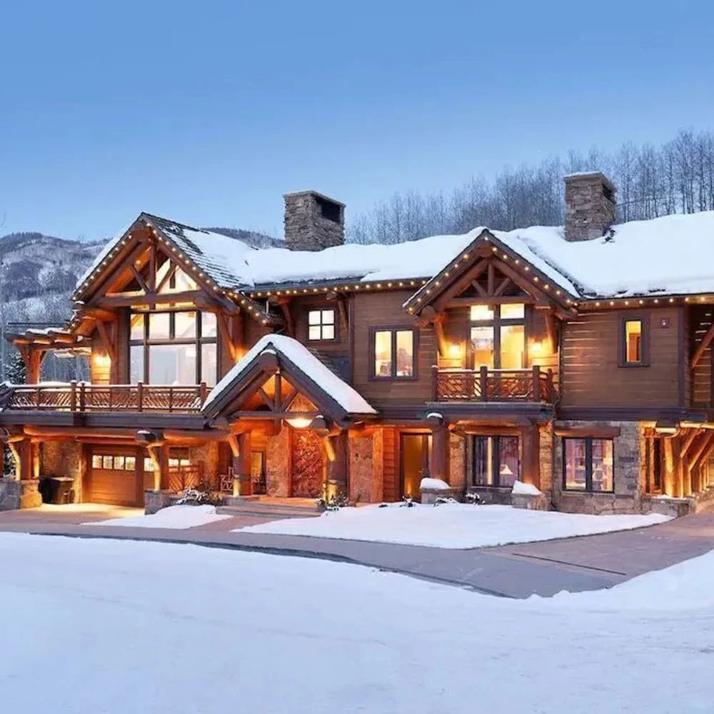 aspen-ski-in-ski-out-intro-image-Ajax-Mansion Snow-covered exterior of luxury home featured in Aspen ski-in/ski-out guide, showcasing premium mountain accommodation.