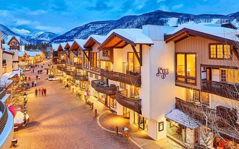 Lodge at Vail ski-in/ski-out hotel at the base of Gondola One with alpine village architecture and snowy streetscape.