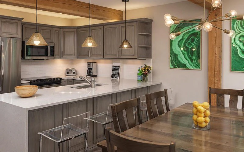Top of the Village Summit 209 Snowmass ski-in/ski-out condo with modern kitchen and mountain views.