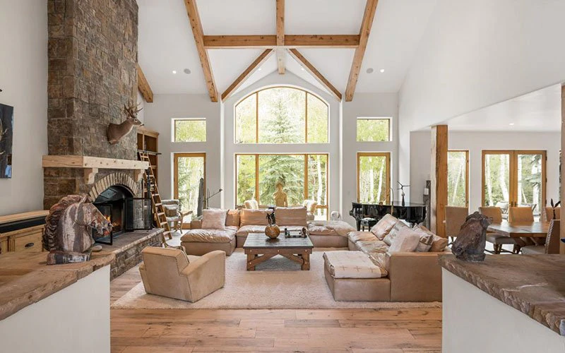 Snow Chalet Snowmass ski-in/ski-out slope-side home with fireplace and forest views.