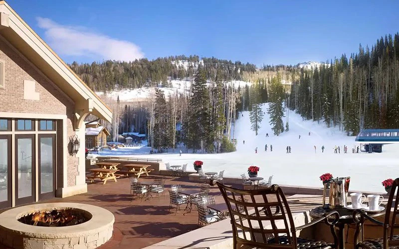 Viewline Resort Snowmass ski-in/ski-out hotel with outdoor patio overlooking the slopes.