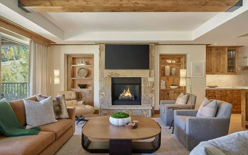 Spacious living room at Little Nell R4SFS, a high-end Aspen ski-in/ski-out condo featuring elegant design and luxury amenities.