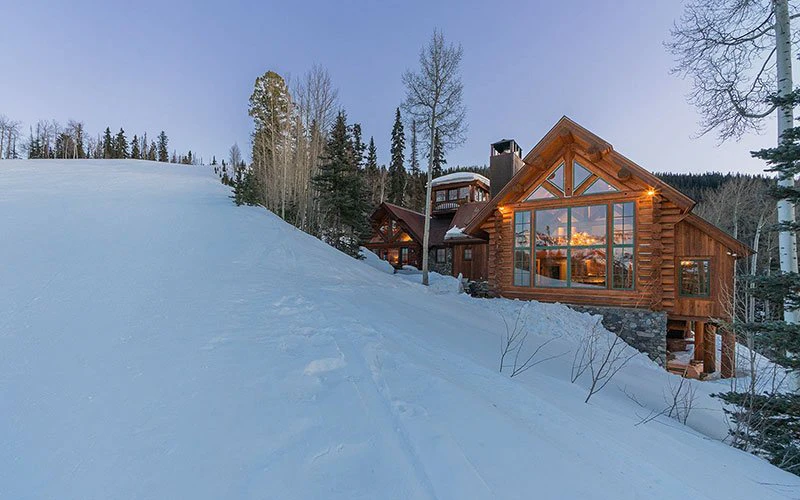 Alpen Lodge Telluride Ski-in/Ski-out mountain cabin with direct slope access and rustic charm.