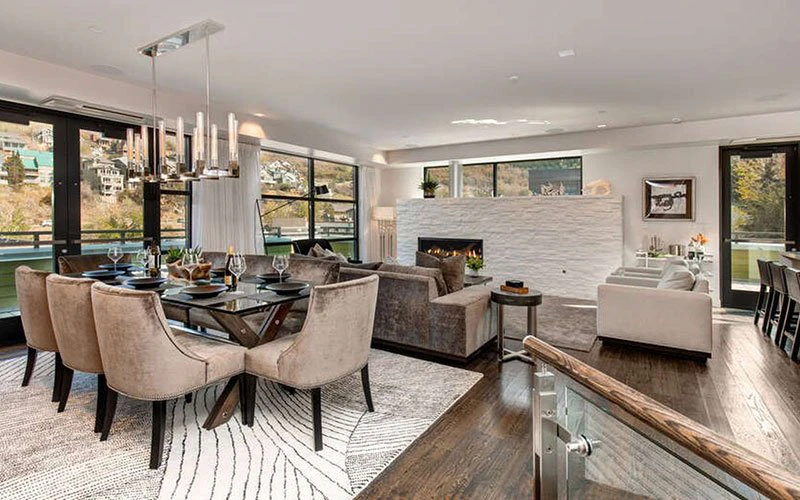 Parkite Penthouse Old Town Park City Condos elegant dining and lounge space with panoramic mountain views.
