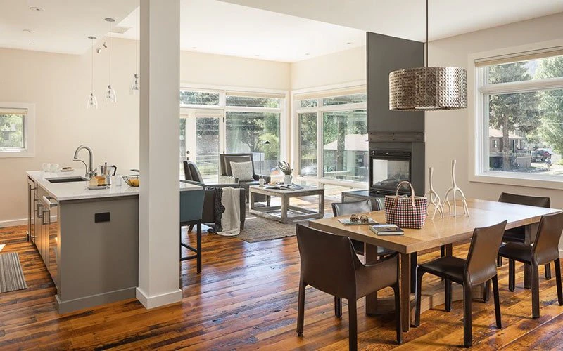 Contemporary design at Pied à Terre, a Jackson Hole condo with sleek interiors, wood flooring, and natural light, perfect for couples seeking comfort and style.