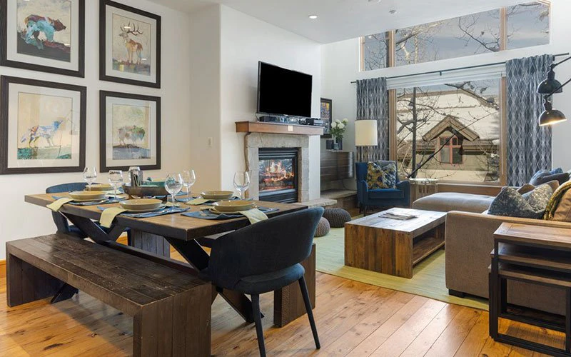 Stylish dining and lounge area at Aspenwood Lodge in Arrowhead Village, a Beaver Creek condo with alpine charm and convenient access to the lifts and hot tubs.