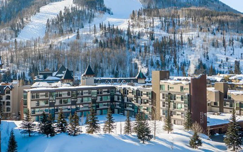 Panoramic winter view of Vail Spa Condominiums, spacious Vail Condos with both indoor and outdoor pools, hot tubs, and spa services.