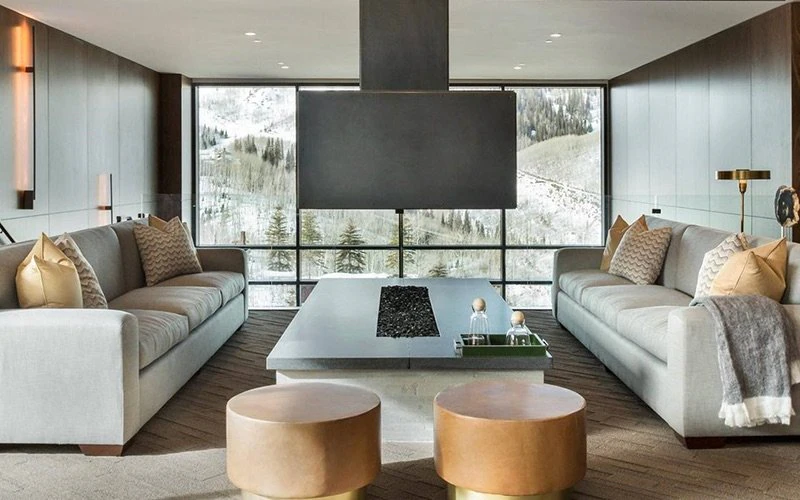 Modern living room with panoramic mountain views at One Empire Pass Lodge, illustrating sleek and stylish Deer Valley Condos.