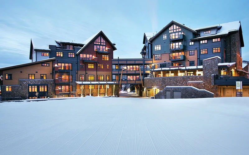 Elegant alpine-style building of One Steamboat Place with ski-in/ski-out access, perfect for luxury Steamboat Springs Condos