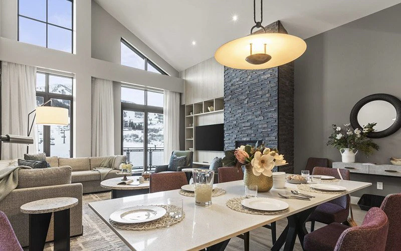 Deer Valley East Deer Valley Condos modern open-plan living and dining area with mountain views and contemporary décor.
